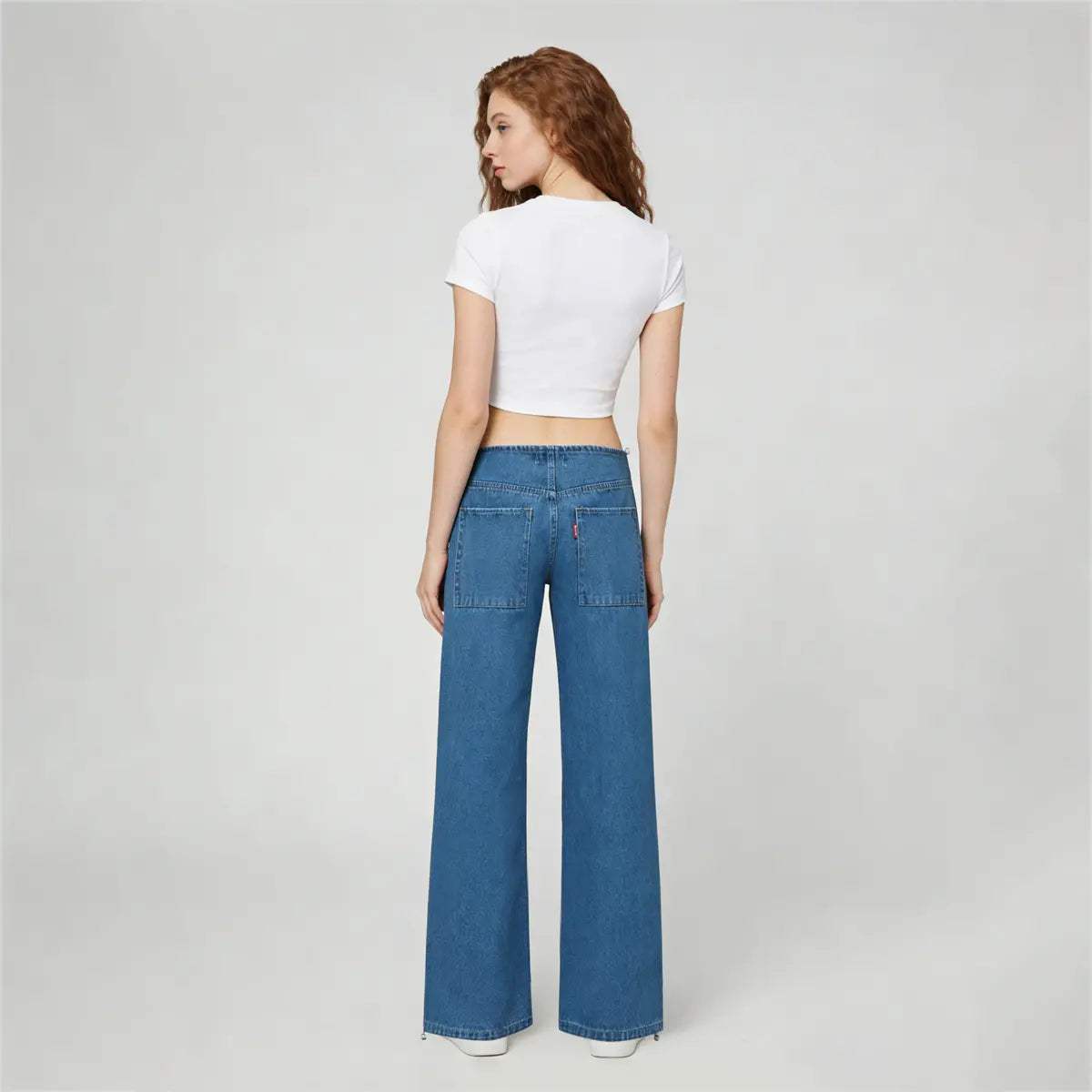 Step into bold street style with the Pwest NYC Low-Rise Wide-Leg Jeans, designed for fashion lovers who embrace the iconic Y2K aesthetic. Featuring a low-rise waist 